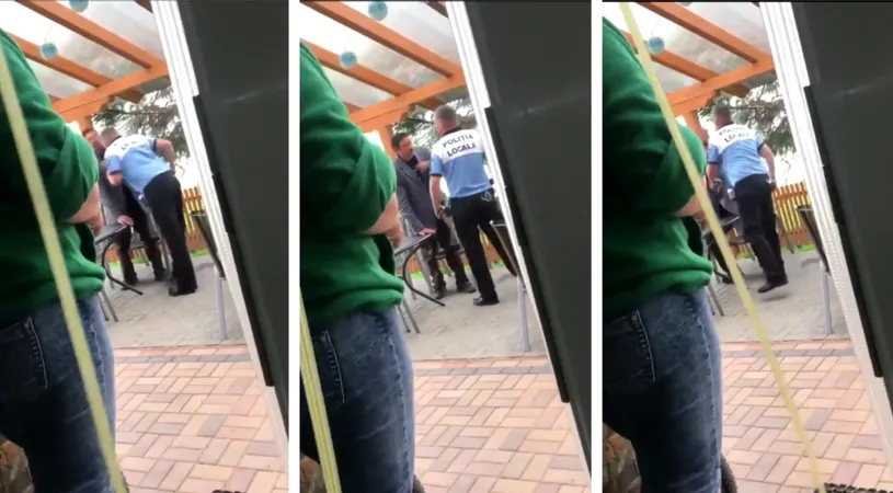 Un politist local din Timis loveste cu capul in gura un om al strazii! Imaginile scandaloase il vor costa scump pe agent! VIDEO
