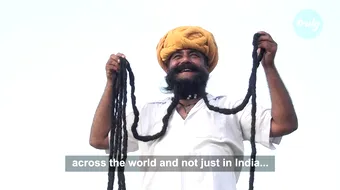 El e barbatul cu cea mai lunga mustata din lume! Are aproape 7 metri si nu si-a mai ras-o de zeci de ani! Cum reuseste sa traiasca cu ea?! VIDEO