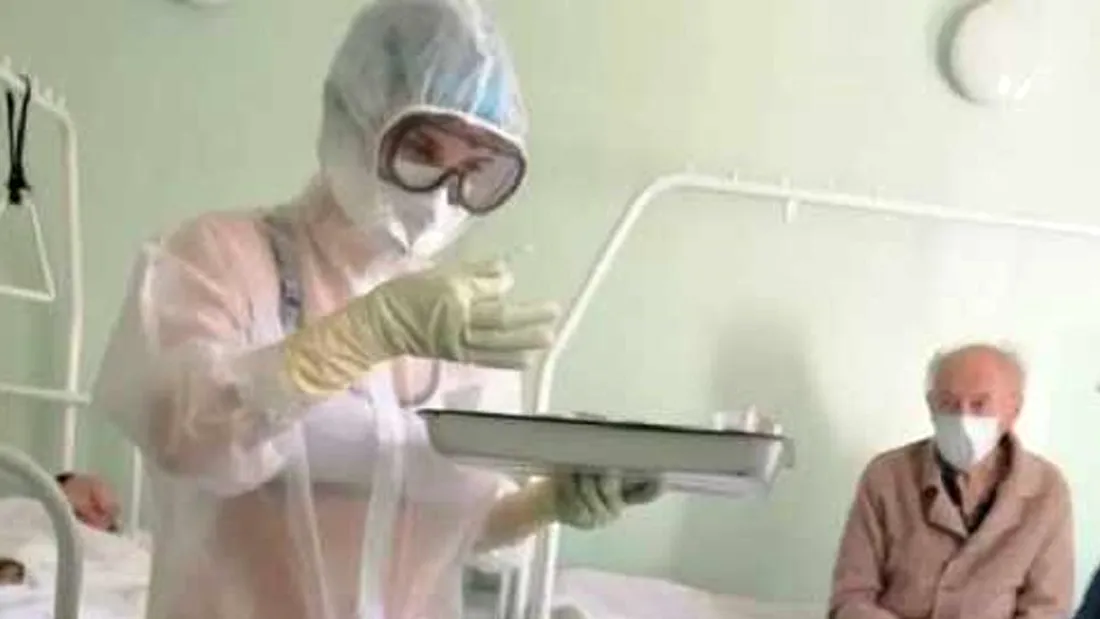 Scandalos! Cum a apărut îmbrăcată o asistentă medicală care trata pacienții infectați cu noul coronavirus