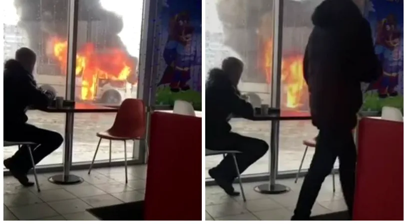 Ireal: acest tanar isi savureaza linistit pranzul, in timp ce afara arde un autobuz, la nici doi pasi de el. Ce se intampla dupa cateva minute VIDEO