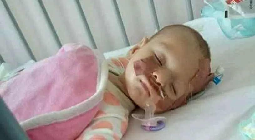 Apelul disperat al parintilor unei fetite de 5 luni, internata la Spitalul Marie Curie! Diana are o malformatie grava la stomac, iar familia nu are bani sa plateasca operatiile care i-ar putea salva viata :(