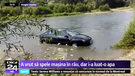 S-a dus sa-si spele masina in raul Arges si aproape i-a luat-o apa. Acum tot el vrea sa dea in judecata autoritatile VIDEO