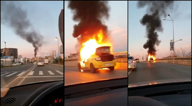 O mașină a luat foc în mers, în București. Pe cine au găsit polițiștii la volan